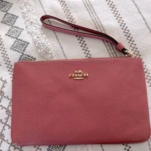 Pink Coach leather wristlet